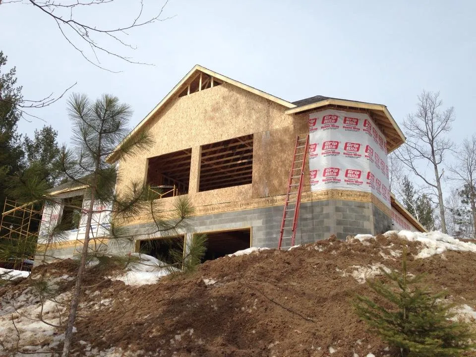Professional roof inspection in Ossineke, MI by Tessmer Contracting & Excavating