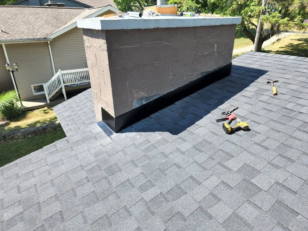 Slide of Testa Roofing