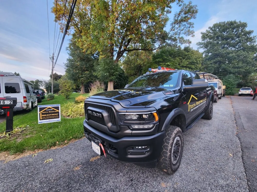 Slide of Testa Roofing