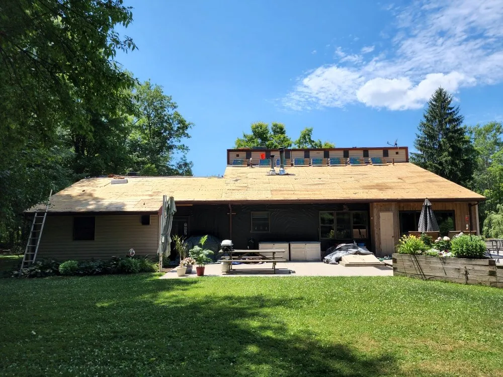 Slide of Testa Roofing