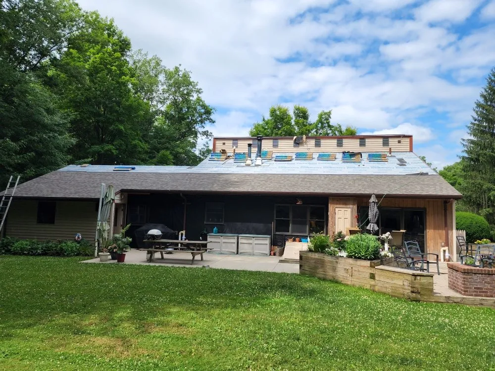 Slide of Testa Roofing