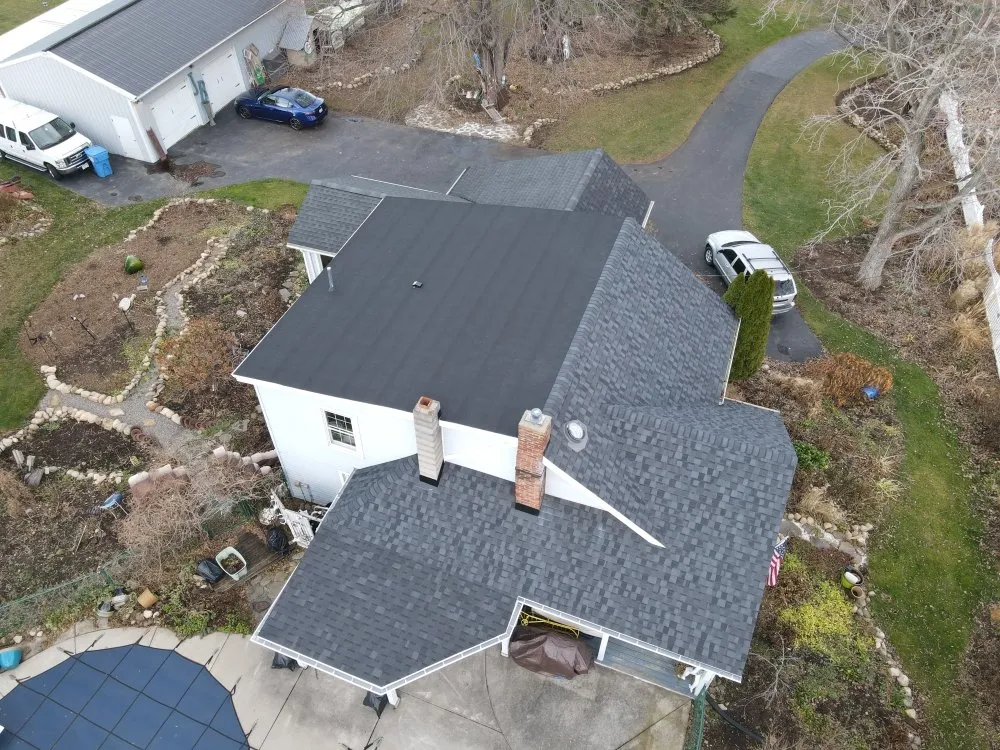 Slide of Testa Roofing