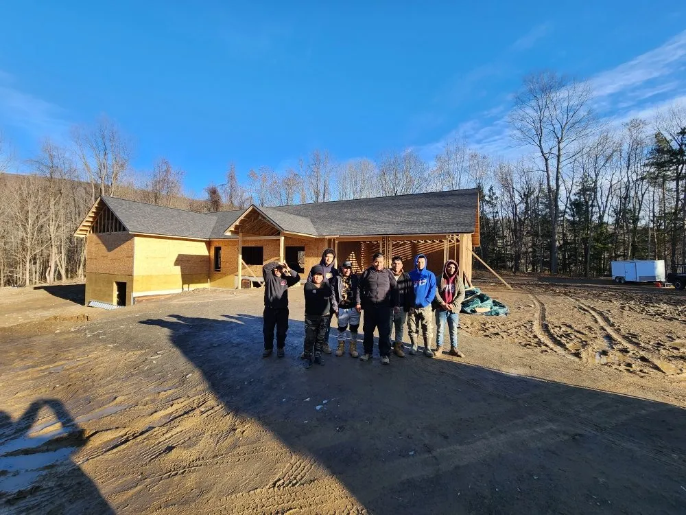 Slide of Testa Roofing