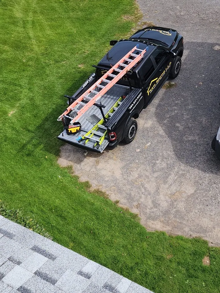 Slide of Testa Roofing