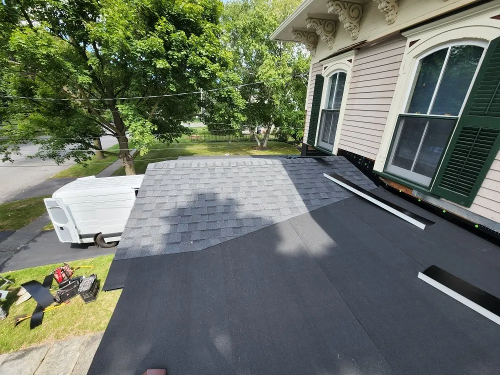 Slide of Testa Roofing