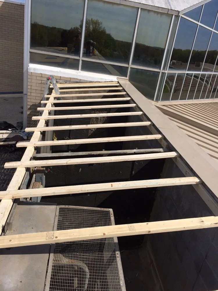 Slide of Testa Roofing