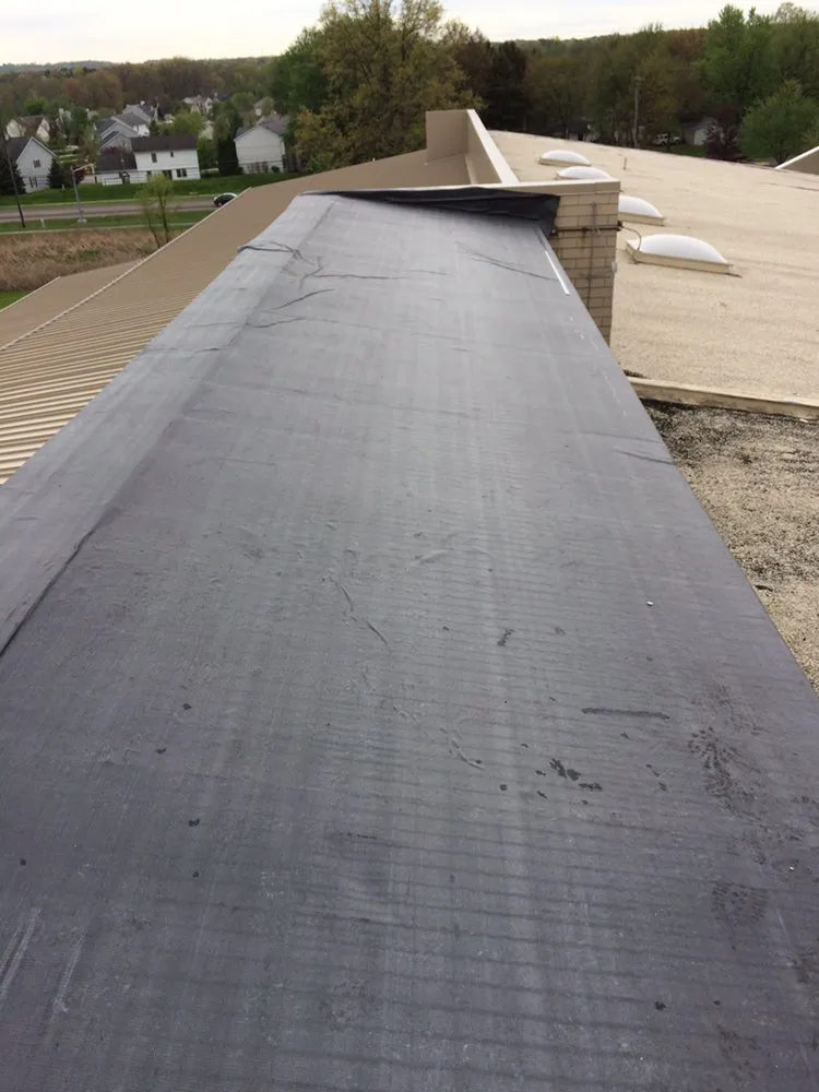 Slide of Testa Roofing