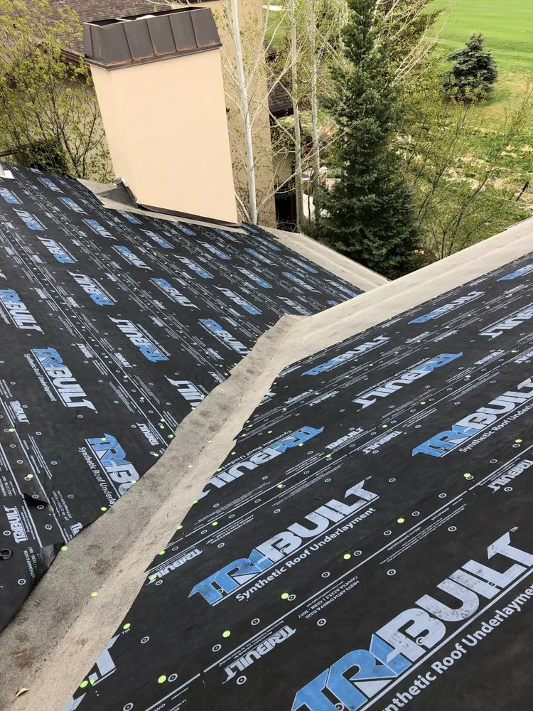 Slide of Teton Roofing