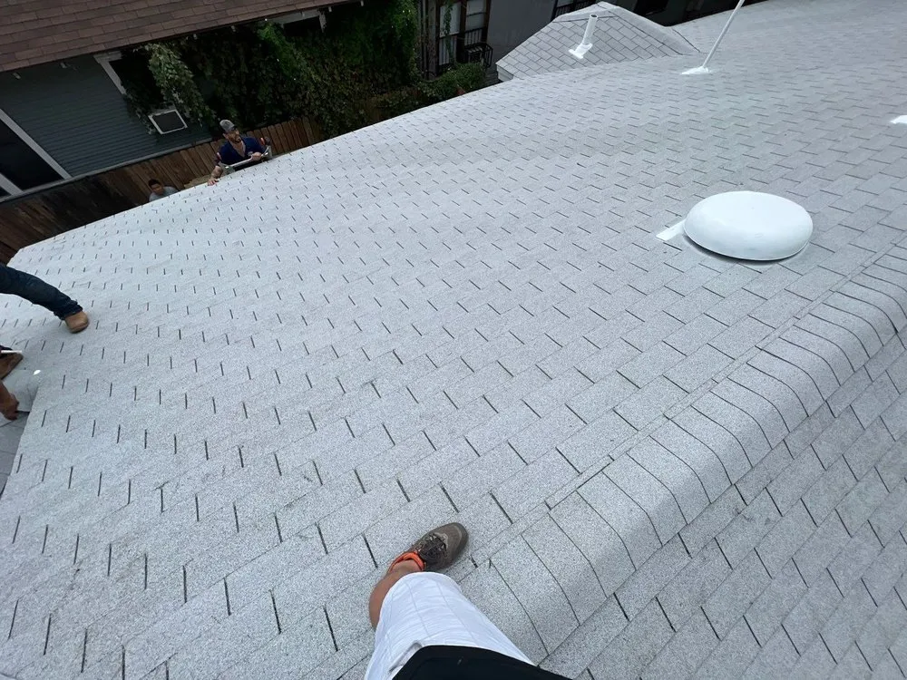 Slide of Texan Roofing Pro