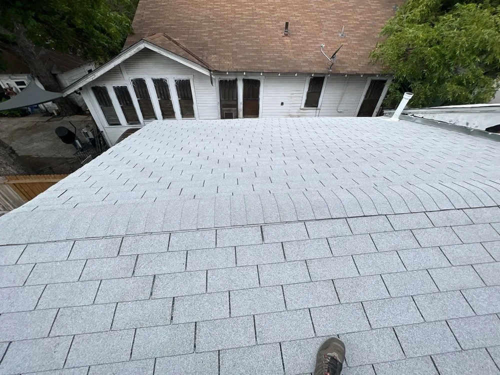 Slide of Texan Roofing Pro