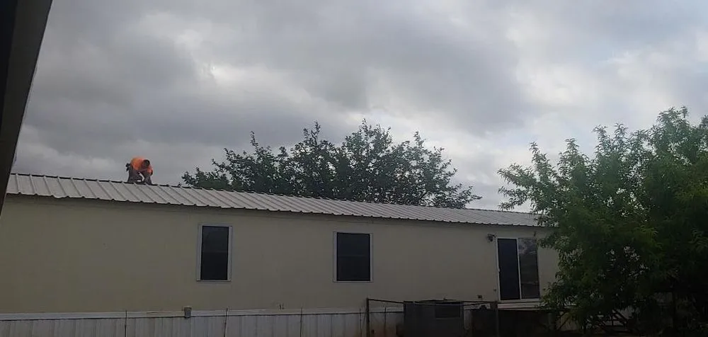 Slide of Texas Home Roofing And Construction