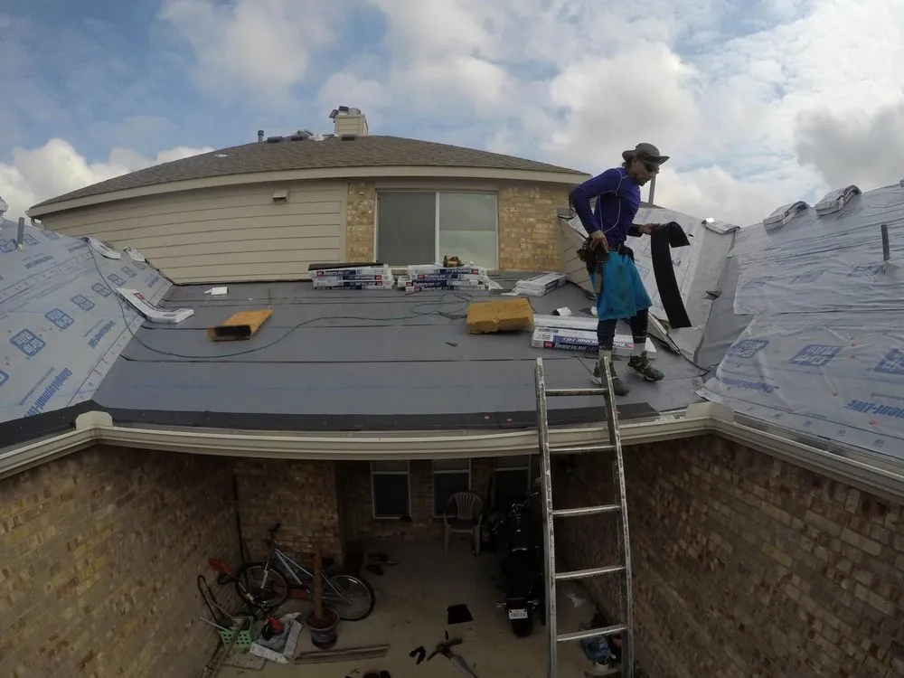 Slide of Texas Roofing and Construction