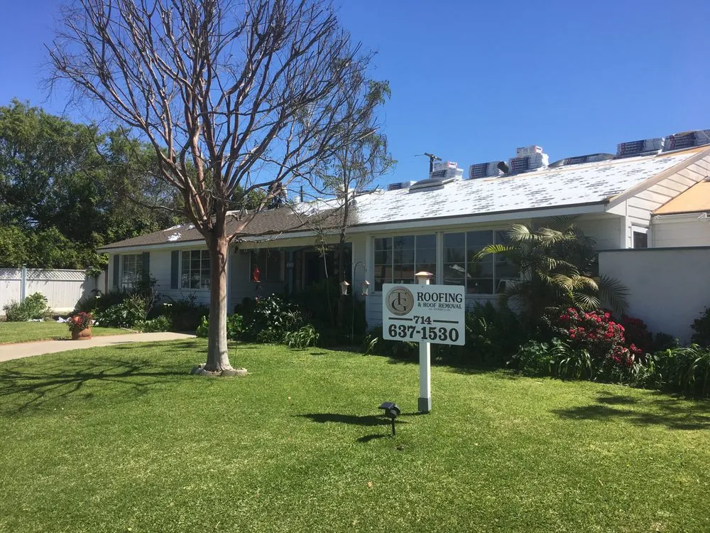 Slide of TG Roofing and Roof Removal