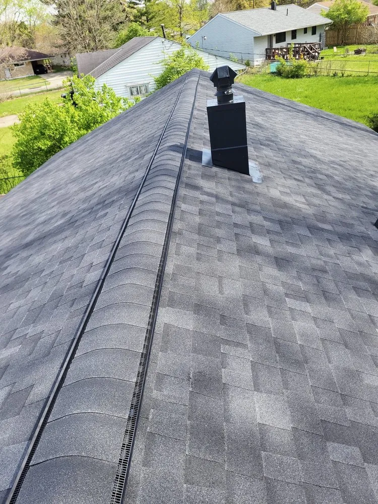 Slide of TGE Roofing