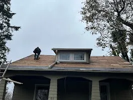 Slide of That Girl Roofing