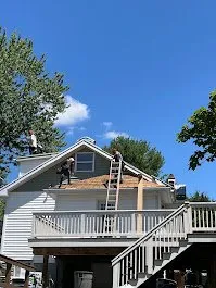 Slide of That Girl Roofing