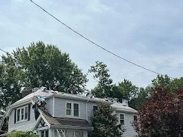 Slide of That Girl Roofing