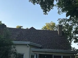 Slide of That Girl Roofing