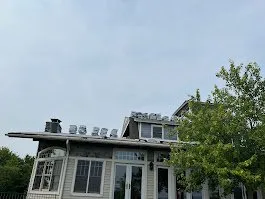 Slide of That Girl Roofing