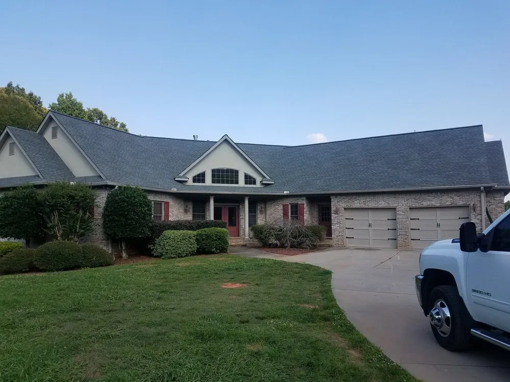 Slide of Thaxton Roofing