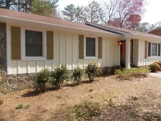 Slide of Thaxton Roofing