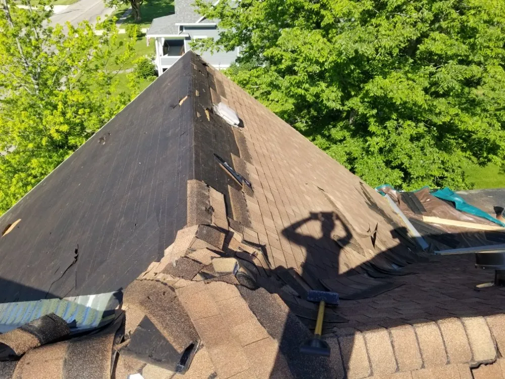 Slide of The 3 Roofers Construction