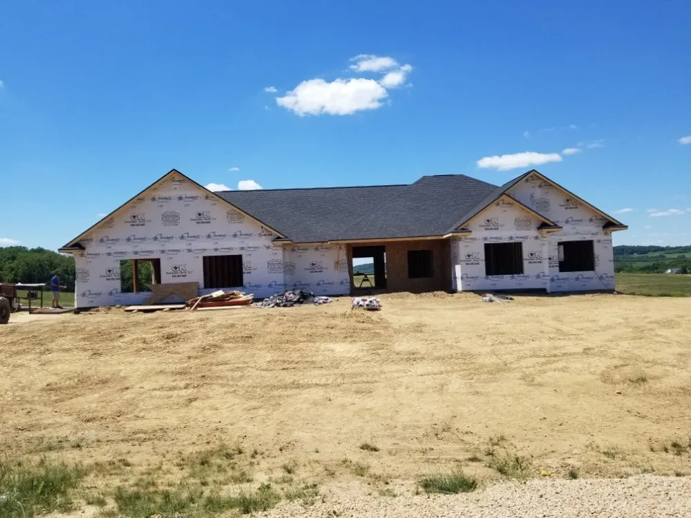 Slide of The 3 Roofers Construction