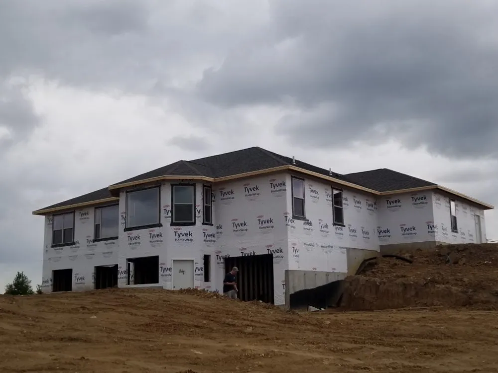 Slide of The 3 Roofers Construction