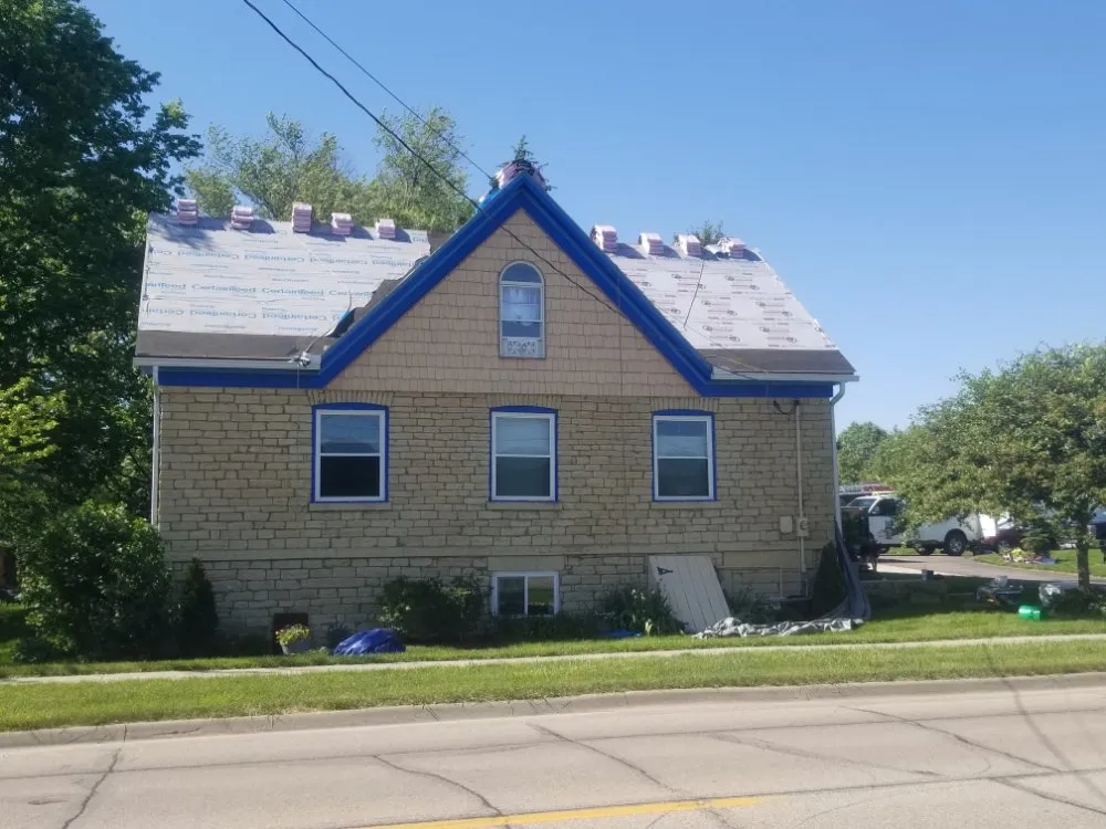 Slide of The 3 Roofers Construction