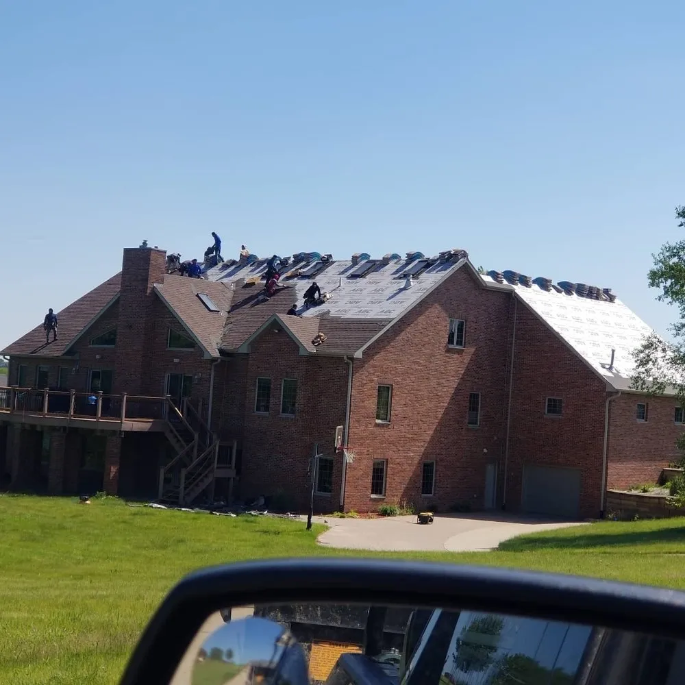 Slide of The 3 Roofers Construction