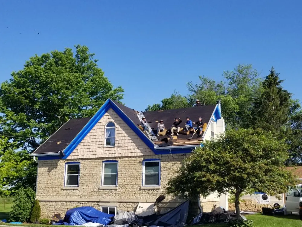 Slide of The 3 Roofers Construction