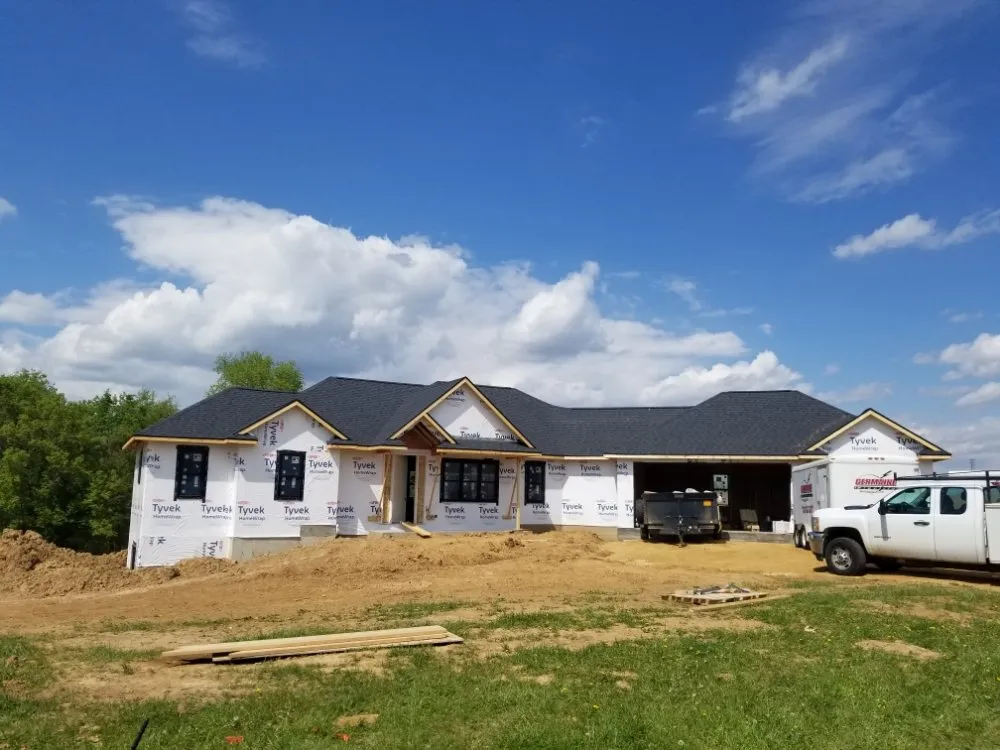 Slide of The 3 Roofers Construction