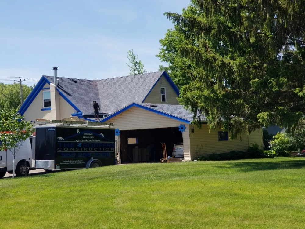 Slide of The 3 Roofers Construction