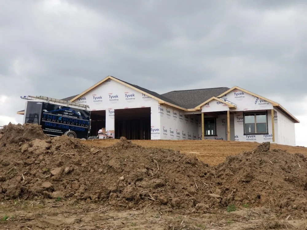 Slide of The 3 Roofers Construction