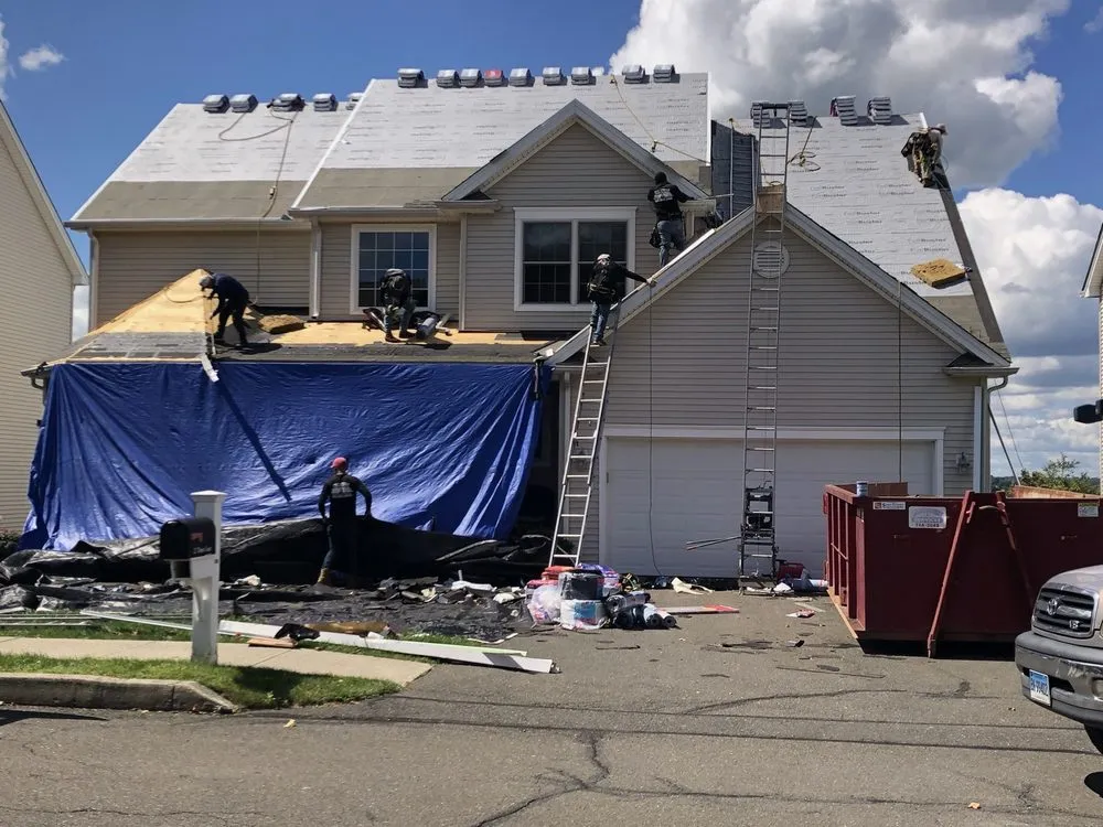 Slide of The Aiello Roofing Company