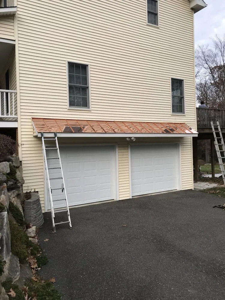 Slide of The Aiello Roofing Company