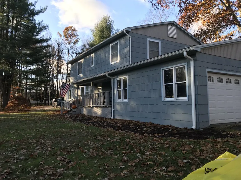 Slide of The Aiello Roofing Company