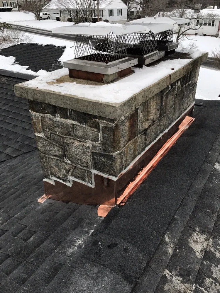 Slide of The Aiello Roofing Company