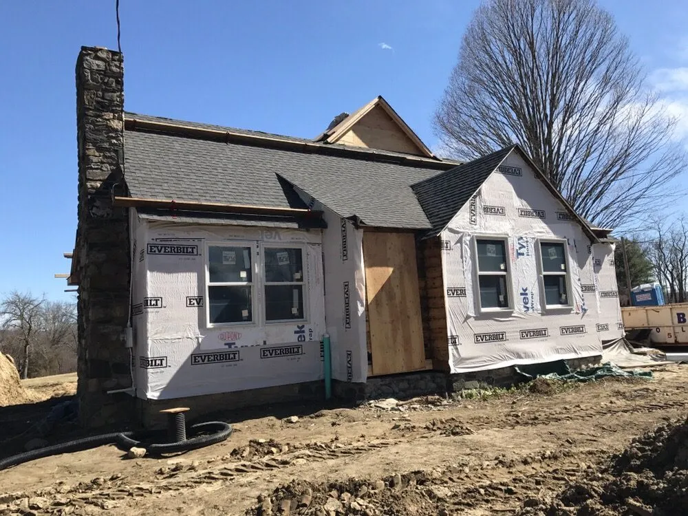 Slide of The Aiello Roofing Company