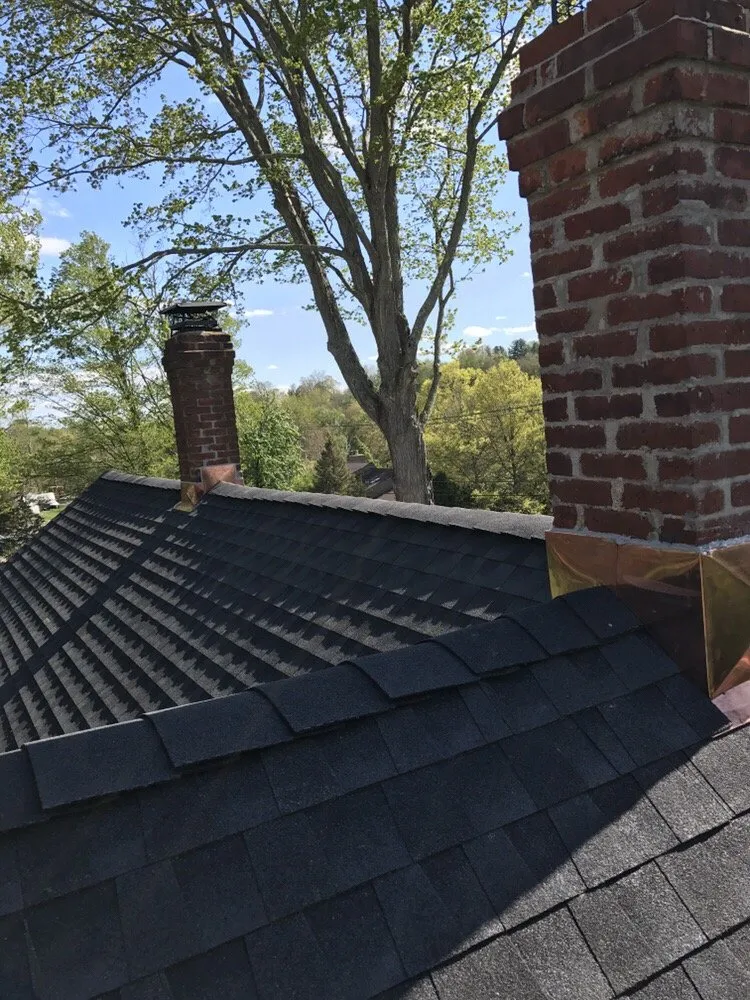 Slide of The Aiello Roofing Company