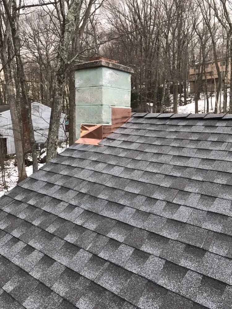 Slide of The Aiello Roofing Company