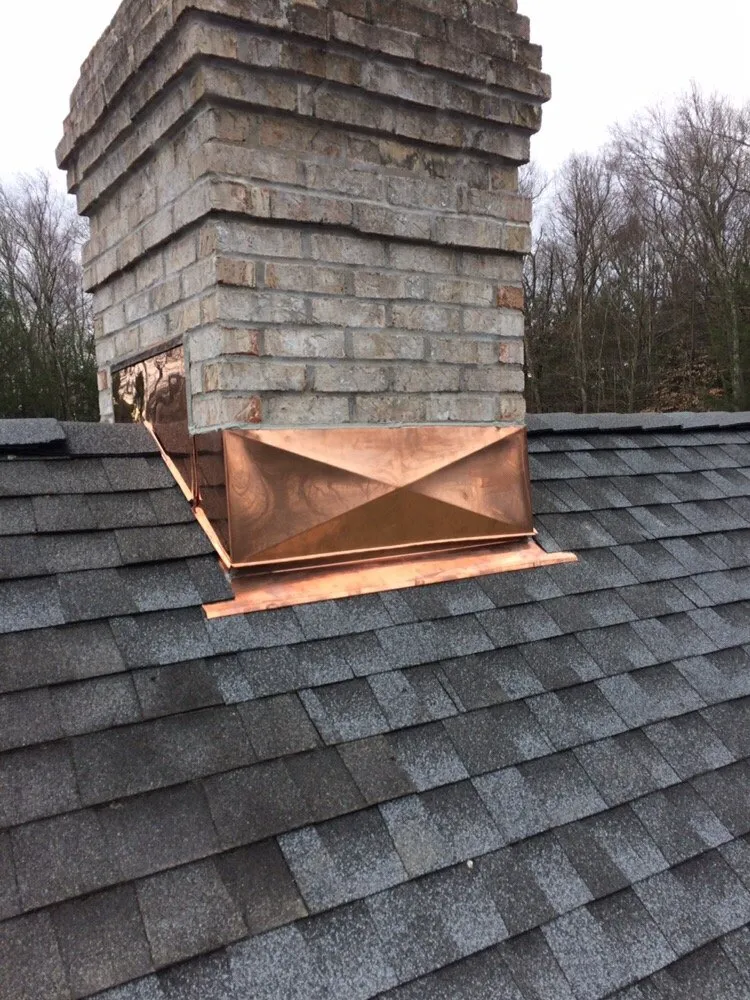 Slide of The Aiello Roofing Company