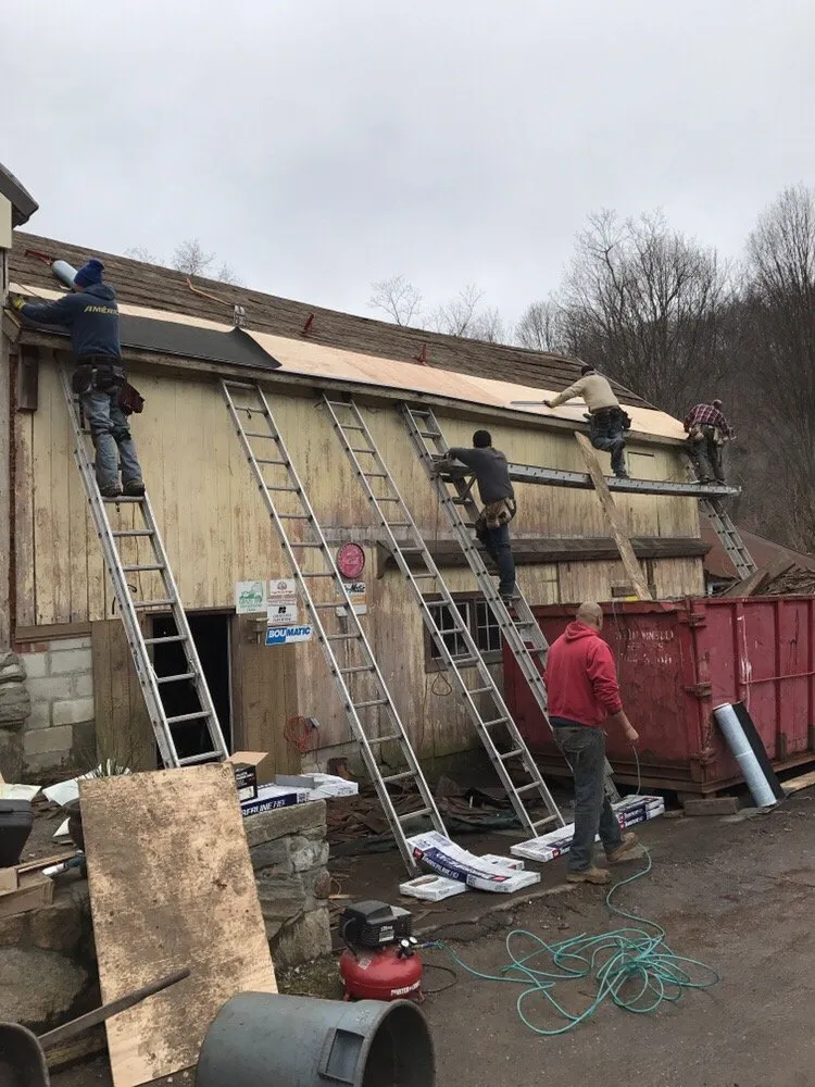 Slide of The Aiello Roofing Company