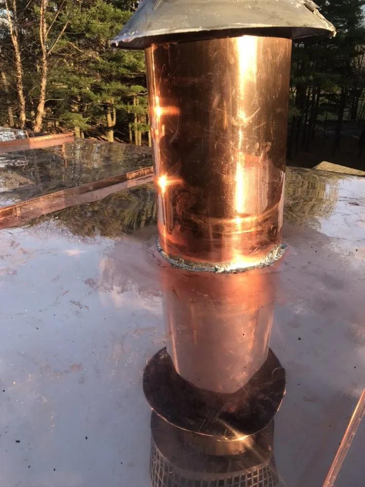 Slide of The Aiello Roofing Company