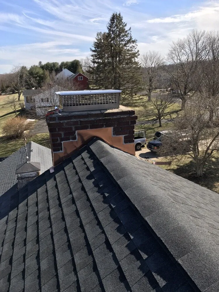 Slide of The Aiello Roofing Company