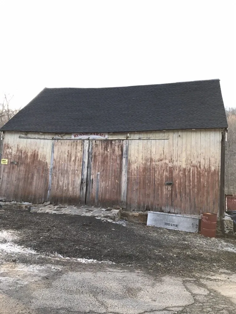 Slide of The Aiello Roofing Company