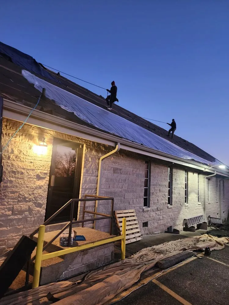 Slide of The Barn Guys