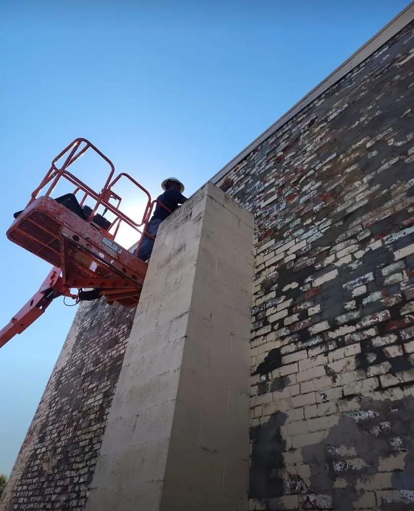 Slide of The Barn Guys