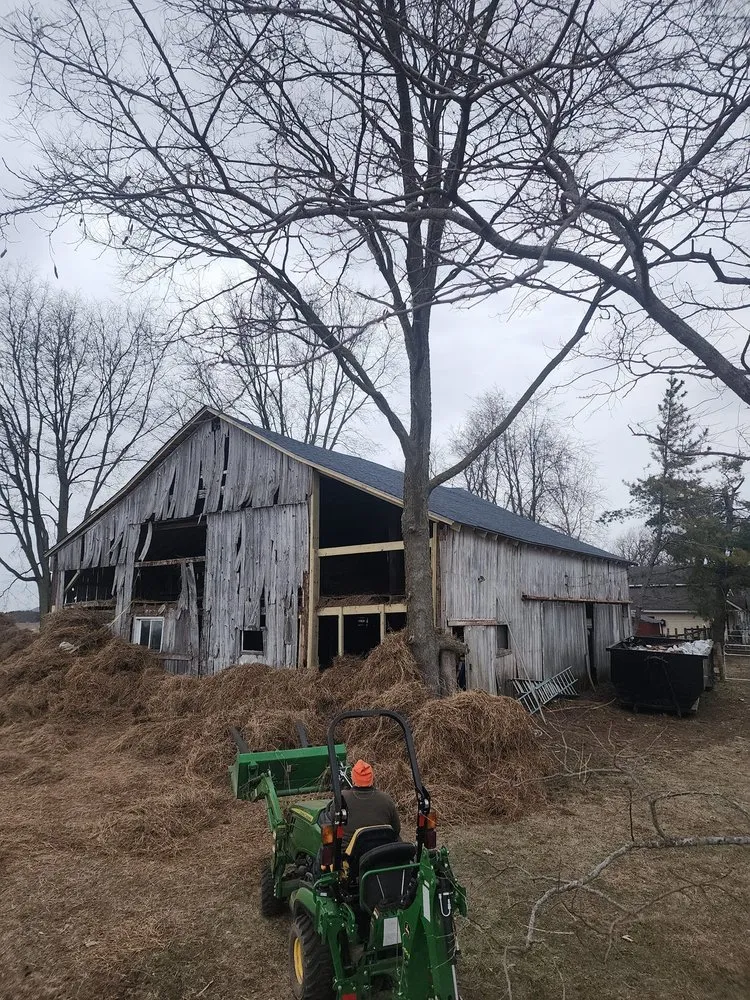 Slide of The Barn Guys