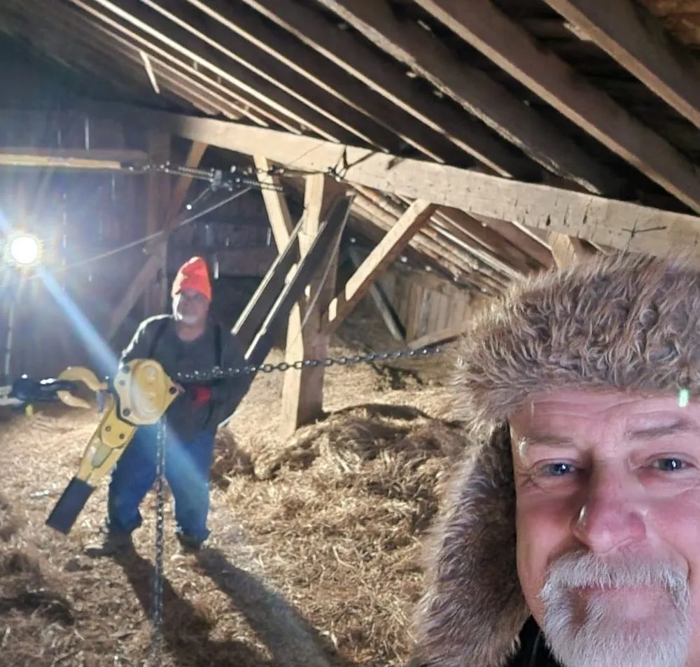 Slide of The Barn Guys